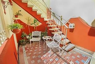 'Escaleras hacia la terraza' Casas particulares are an alternative to hotels in Cuba.