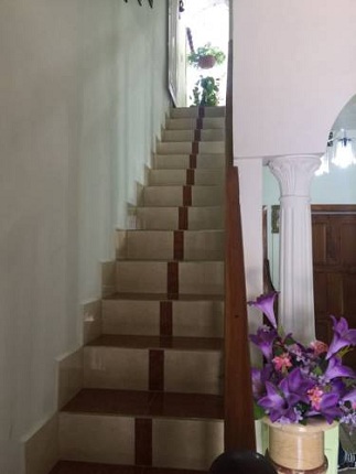 'Escaleras' Casas particulares are an alternative to hotels in Cuba.