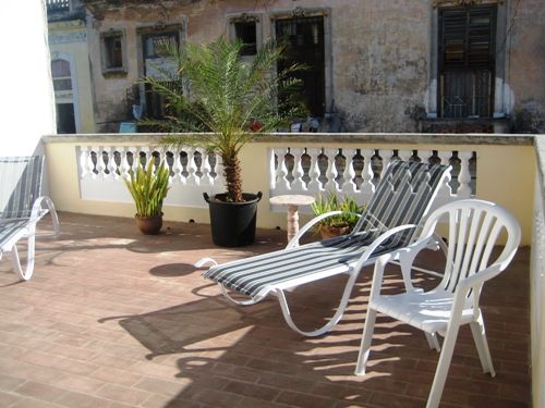 'terrace' Casas particulares are an alternative to hotels in Cuba.