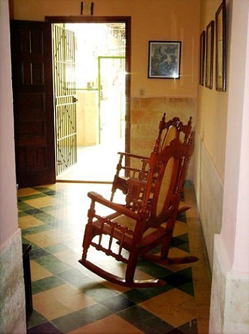 'Rocking chairs in the Living room' Casas particulares are an alternative to hotels in Cuba.