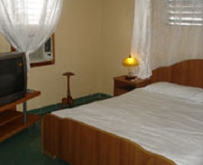 'Bedroom in private apartment' Casas particulares are an alternative to hotels in Cuba.