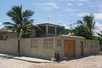 'The private entrance is the small door at the left' Casas particulares are an alternative to hotels in Cuba.